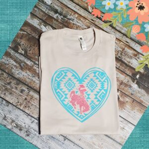 Shop Wyoming Aztec Bucking Horse & Rider®️ ~Spotted Cow~ Heather Dust Tee