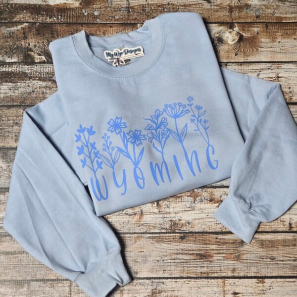 Shop Wyoming Wildflower WYO ~ Gildan Sweatshirt ~Light Blue