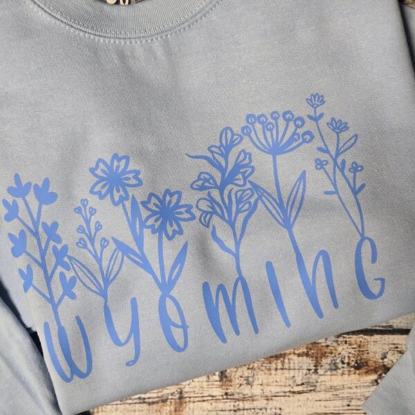 Shop Wyoming Wildflower WYO ~ Gildan Sweatshirt ~Light Blue