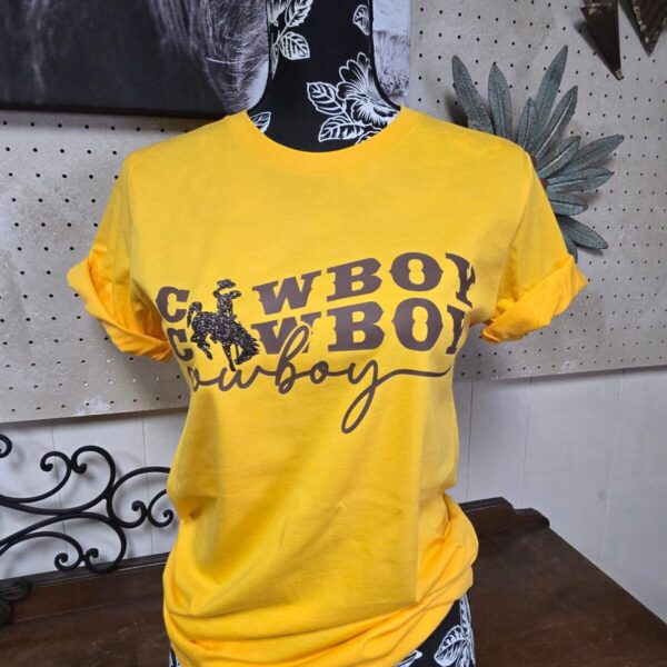 Shop Wyoming Those Cowboys!~ Steamboat ~ Wyo Gold Bella Tee