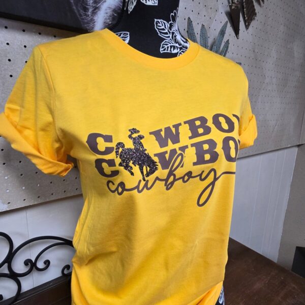 Shop Wyoming Those Cowboys!~ Steamboat ~ Wyo Gold Bella Tee