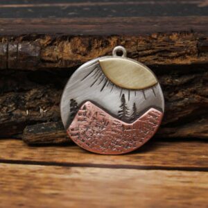 Shop Wyoming Oval Sunburst Mountain Necklace